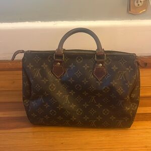 Authentic signature monogram Louis Vuitton purse